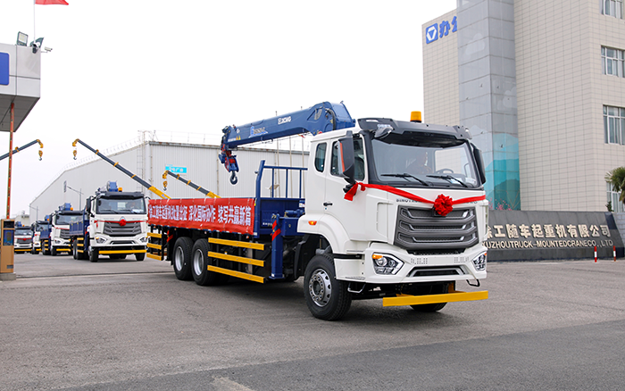币游国际SQS250随车起重机批量发车，助力 “一带一路” 沿线基建腾飞